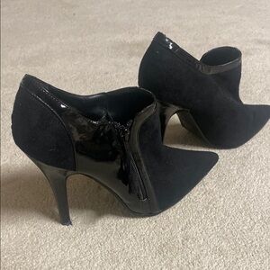 Elegant Black heeled ankle boot size 9
